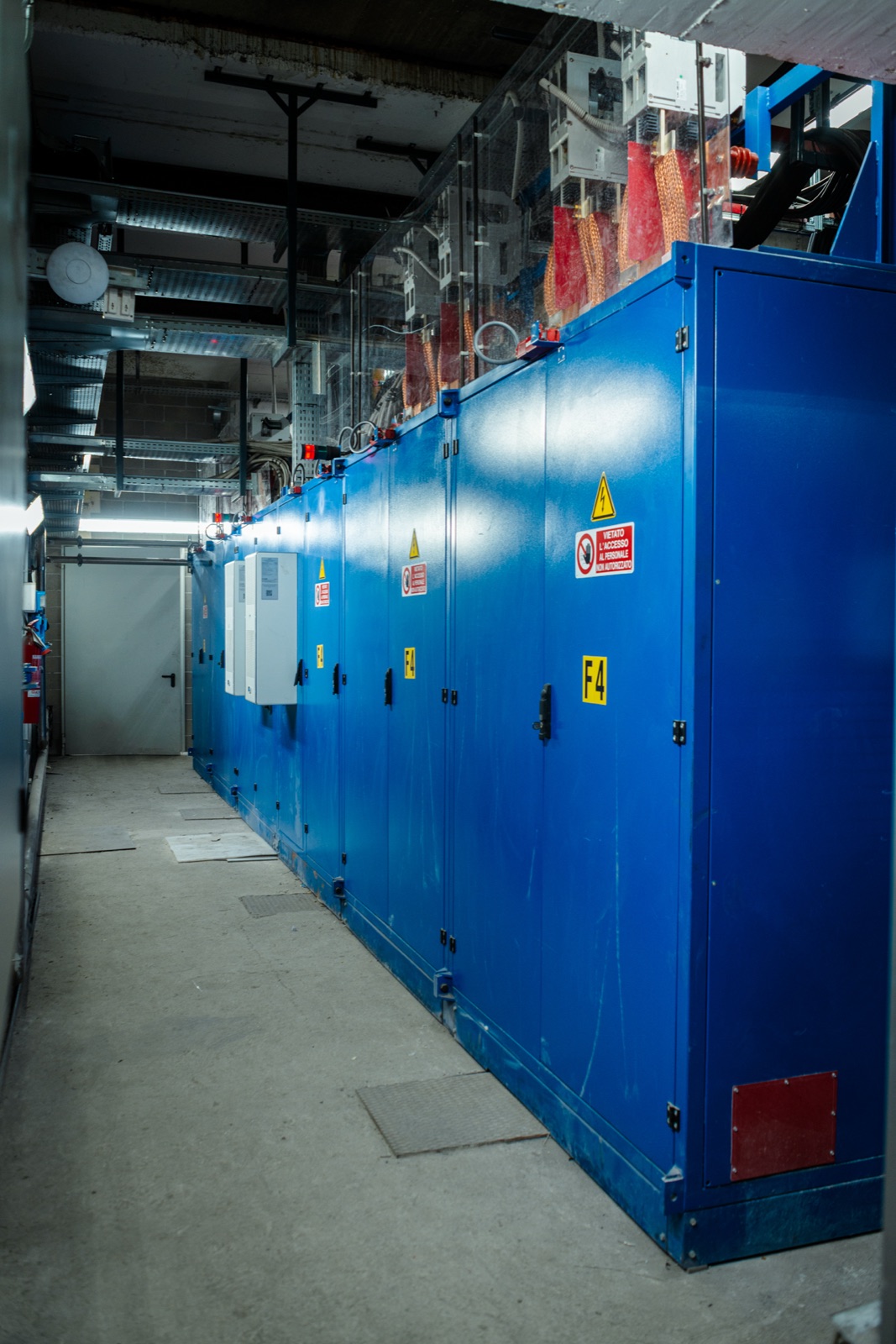 Row of CIME IGBT converter cabinets in the foundry electrical room